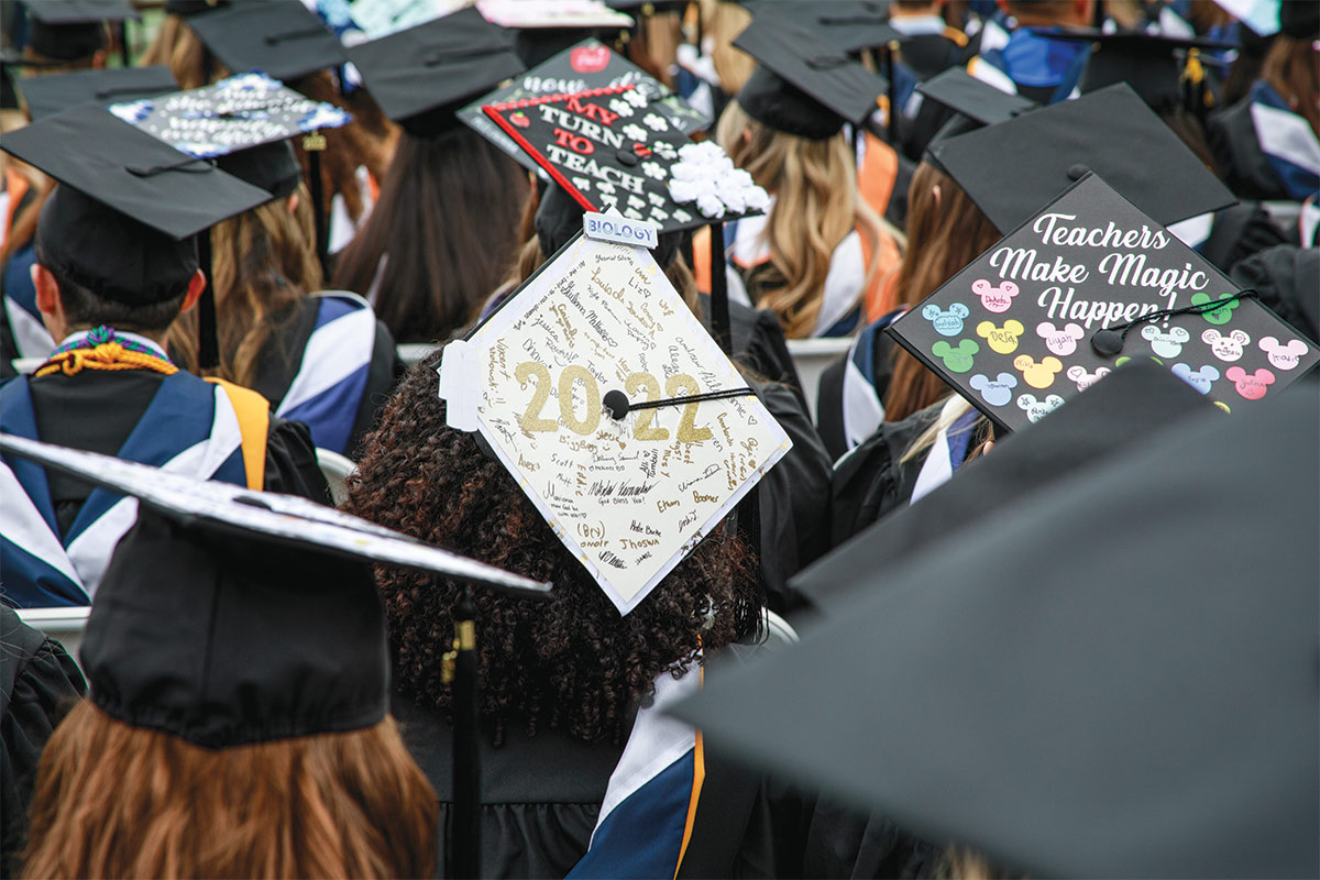 Crowd of graduates with their decorated hats