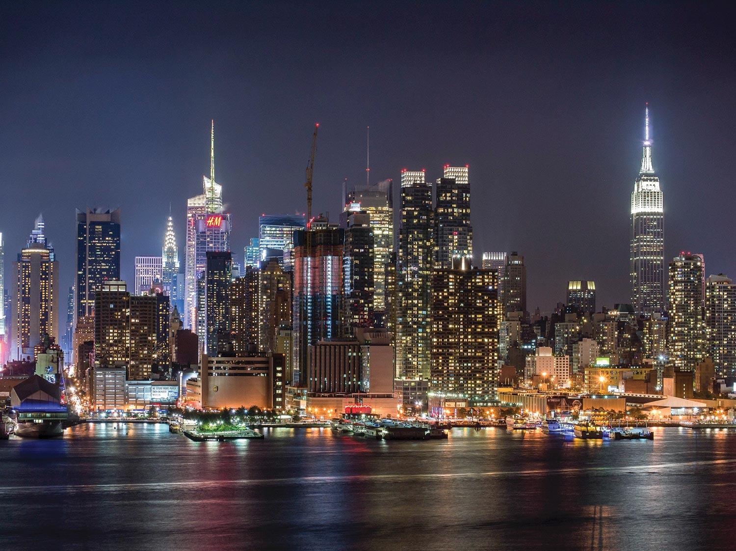 A landscape photograph of the New York City skyline at night