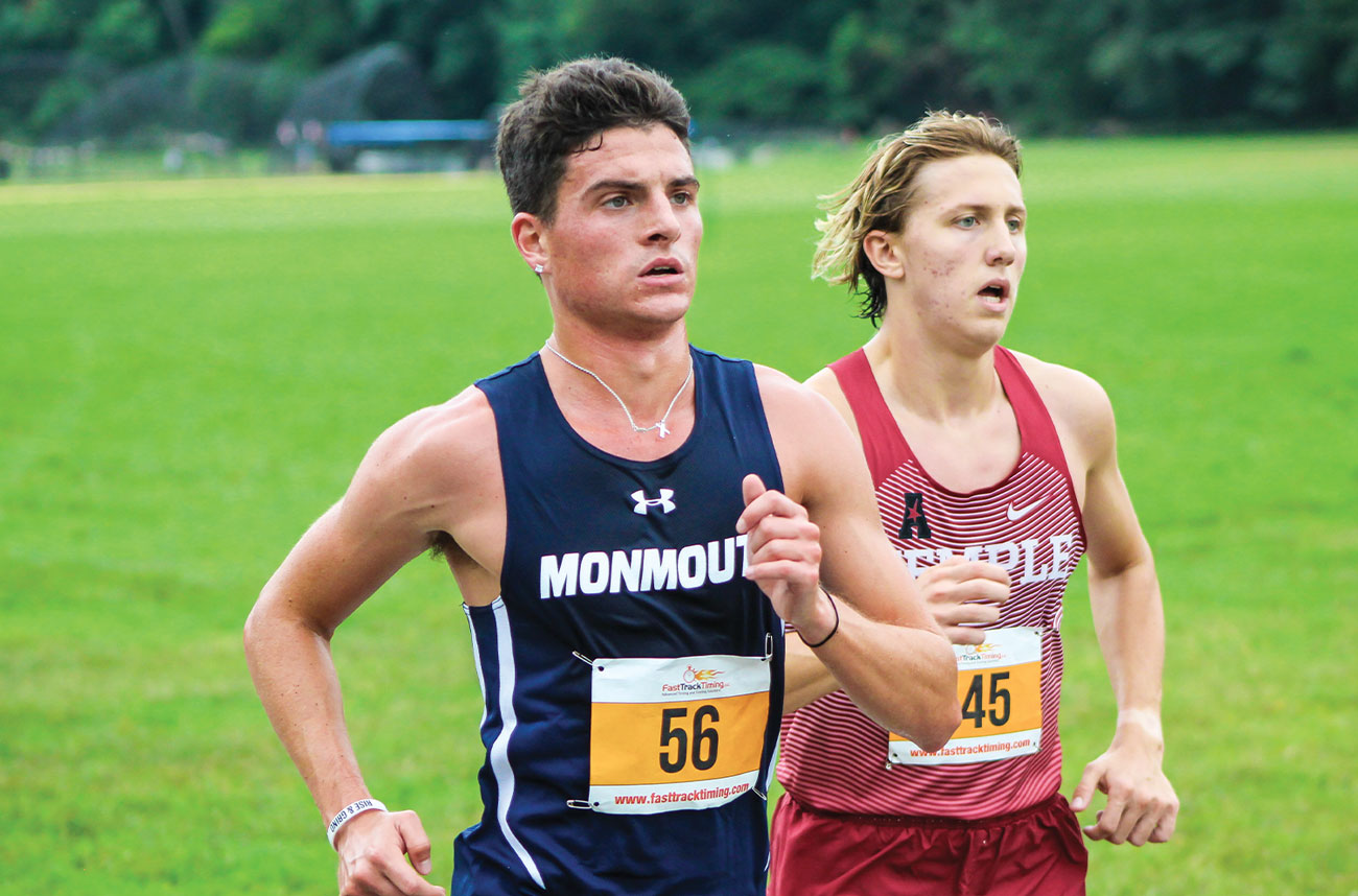 Louis DiLaurenzio of the Monmouth Men's cross country team wears a look of calm determination as runs during a meet