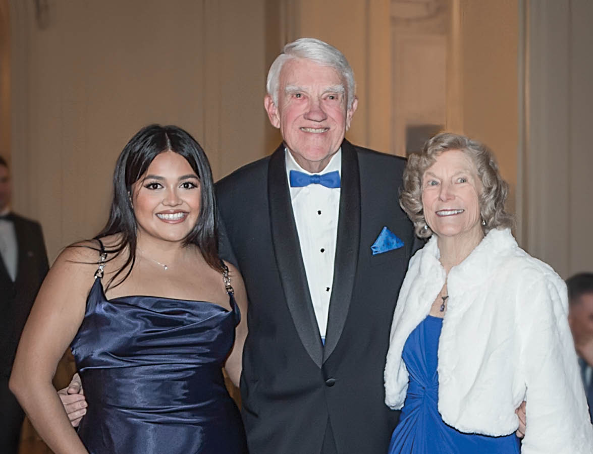 Senior Maria Monzon with President’s Medal recipients Charlie ’01HN and Trudy Parton