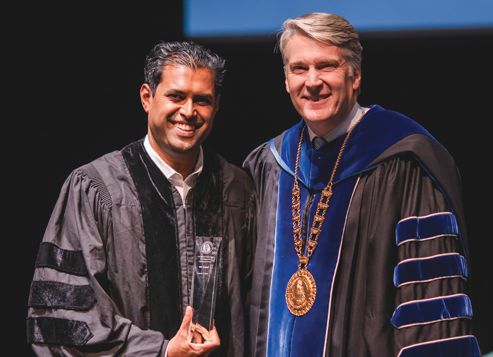 State Sen. Vin Gopal receiving the Pollak Award from President Leahy