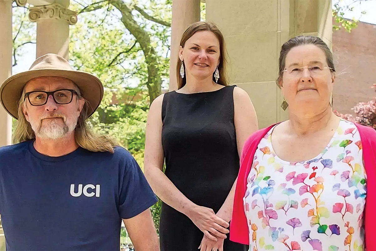 Peter Jacques, Michelle Schpakow, and Catherine Duckett posing together outdoors
